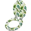 A toilet seat and lid with a tropical leaf pattern. Produktbild-Vorschau