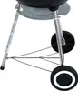 Close-up view of the lower part of a black charcoal kettle grill, showing its legs, wheels, and a metal shelf. Produktbild-Vorschau