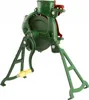 A green and red manual corn sheller with a wooden handle, standing on its legs against a white background. Náhled obrázku produktu