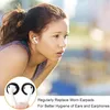 A woman wearing earbuds, with a close-up inset of earbud covers. Produktbild-Vorschau