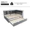 A 3D rendering of a gray sofa bed with an extended pull-out bed and built-in shelving, with dimensions and specifications overlaid. Voir les images du produit