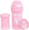 A pink baby bottle and accessories are displayed against a white background. Podgląd zdjęcia produktu