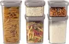 A set of five clear plastic food storage containers with gray lids, filled with different food items. Produktbild-Vorschau