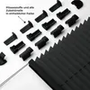 A collection of black pleating fabric and accessories for a blind, laid out on a white background. Produktbild-Vorschau