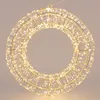 A lit-up metal wreath with warm white LEDs. Podgląd zdjęcia produktu