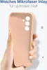 A hand holding a pink phone case. Produktbild-Vorschau