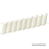 A beige sun sail with a scalloped edge, suspended by thin wires, shown in a repeating pattern. Produktbild-Vorschau
