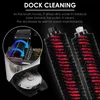 Close-up of cleaning brushes and a robotic vacuum cleaner in its dock. Produktbild-Vorschau