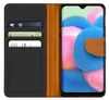 A flip case for a smartphone is shown open, revealing card slots on one side and the phone screen on the other. Podgląd zdjęcia produktu
