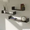 Three shelves mounted on a wall, with a plant on the top left shelf, books on the middle and bottom shelves, and a clock on the bottom shelf. Náhľad obrázku produktu