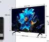 A television screen displaying a vibrant blue flower, with dimensions indicated by measurement lines and numbers. A remote control is shown to the left of the television. Produktbild-Vorschau