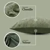 A close-up view of a cushion, highlighting its two different fabric textures. Produktbild-Vorschau