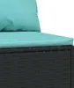 A close-up view of a black rattan sofa with turquoise cushions. Podgląd zdjęcia produktu