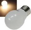 A close-up studio shot of a white LED light bulb with a silver screw base, set against a white and light gray background. A smaller inset image shows a lit light bulb emitting warm white light. Produktbild-Vorschau