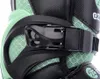 A close-up of the buckle and strap of a black and green inline skate. Podgląd zdjęcia produktu