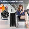 A woman is sitting in an airport lounge, using her phone which is plugged into a suitcase. Anteprima dell’immagine prodotto