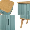 A collage of four close-up images of a blue and wood side table. Podgląd zdjęcia produktu