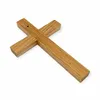 A wooden cross is shown against a white background. Podgląd zdjęcia produktu