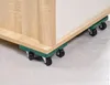 A close-up view of furniture movers under a piece of furniture. Produktbild-Vorschau
