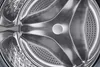 Close-up view of the inside of a washing machine drum. Produktbild-Vorschau