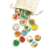 A collection of wooden tokens with cat illustrations and two dice spilling out of a drawstring bag. Anteprima dell’immagine prodotto