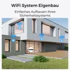 A modern house with a lawn and a wooden deck, illustrating a WiFi system. Produktbild-Vorschau