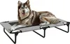 A husky dog lying on a raised pet bed. Produktbild-Vorschau