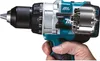 A hand holding a power drill with a cutaway view showing internal gears. Anteprima dell’immagine prodotto