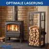 A wood-burning stove with a log rack filled with firewood, set against a stone wall. Náhľad obrázku produktu