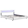 A modern white bed frame with blue LED lighting in the headboard. Náhled obrázku produktu
