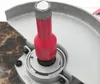 A close-up view of a diamond drill bit attached to a tool, with a protective guard visible. Produktbild-Vorschau