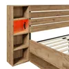 A close-up view of a wooden bed frame with integrated storage and LED lighting. Náhled obrázku produktu