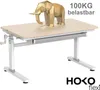 A height-adjustable desk with a geometric elephant sculpture on top. Produktbild-Vorschau