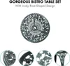 A collage of images showing a bistro table set with a rose design. The main image is a top-down view of the table, with close-up shots of the table's details and legs below. Náhľad obrázku produktu
