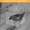 A bird is bathing in a clear acrylic box attached to a bird cage. Produktbild-Vorschau