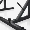Close-up view of the base and support structure of a black metal weightlifting rack. Produktbild-Vorschau