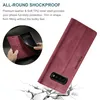 A hand is shown inserting a phone into a red leather phone case. The case is shown from a diagonal angle, with a cracked white surface below it. Produktbild-Vorschau
