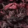 A close-up, overhead view of dried hibiscus flowers. Produktbild-Vorschau