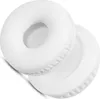 Two white headphone ear pads are shown in a studio shot. Náhled obrázku produktu