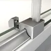A close-up view of a shower door sliding mechanism, showing the roller and track. Produktbild-Vorschau