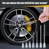 A hand is using a tool to tighten a lug nut on a car wheel. Several drill bits are displayed in the foreground. Náhľad obrázku produktu