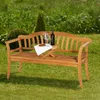 A wooden garden bench with a bottle of wine and two glasses on a small table attached to the bench, set in a grassy garden. Produktbild-Vorschau
