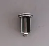 A close-up of a plumbing part on a gray background. Podgląd zdjęcia produktu