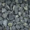 Grüngrau gemaserte Splittsteine dicht aneinander liegend im Detail Produktbild-Vorschau