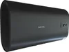 A black electric boiler is shown in a studio setting against a white background. Produktbild-Vorschau