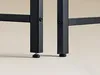 Close-up of the legs of a black desk. Náhled obrázku produktu