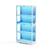 A white, four-tier glass display cabinet with blue LED lighting, shown against a white background. Náhled obrázku produktu