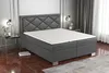 A modern bedroom setting with a gray boxspring bed as the focal point. Produktbild-Vorschau