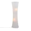 A tall, white, fabric floor lamp with a curved, hourglass shape, lit from within. Produktbild-Vorschau