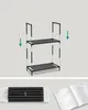 Illustration showing the assembly of a two-tier shelf unit, with a bundle of black tubes and an instruction manual below. Náhled obrázku produktu
